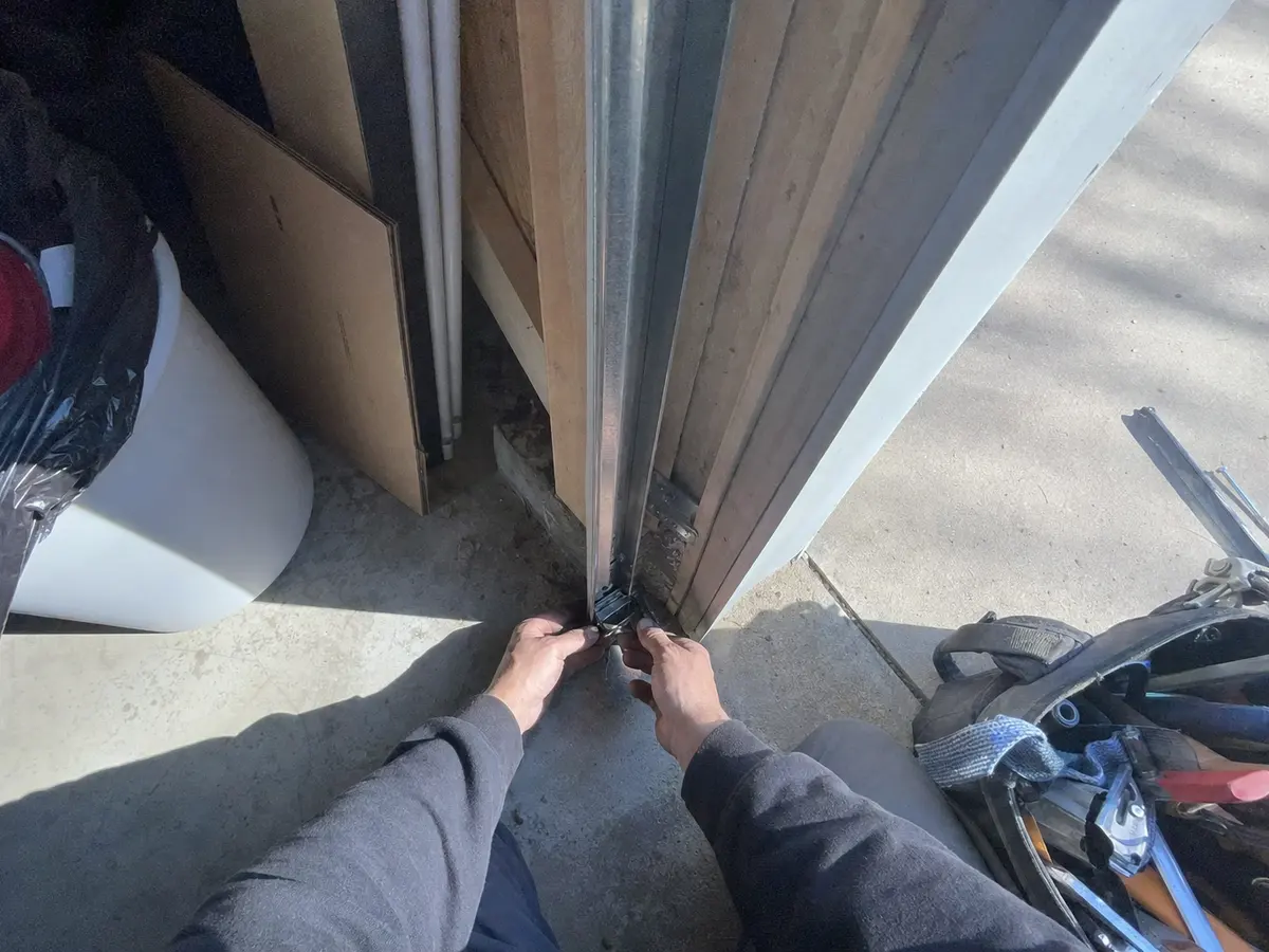 garage door repair technician on the job in Elk Grove, CA